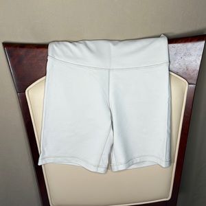 Aritzia TNA 7 inch inseam biker shirt in ivory never worn!